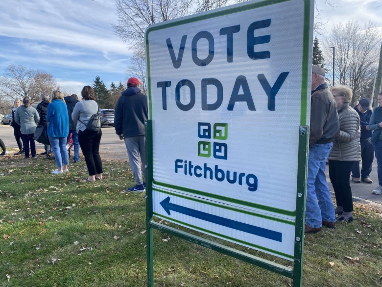 Voting lines stretch outside the Fitchburg, Wis. fire station on Lacy Road around 2 p.m. Tuesday, Nov. 8, 2022. 
