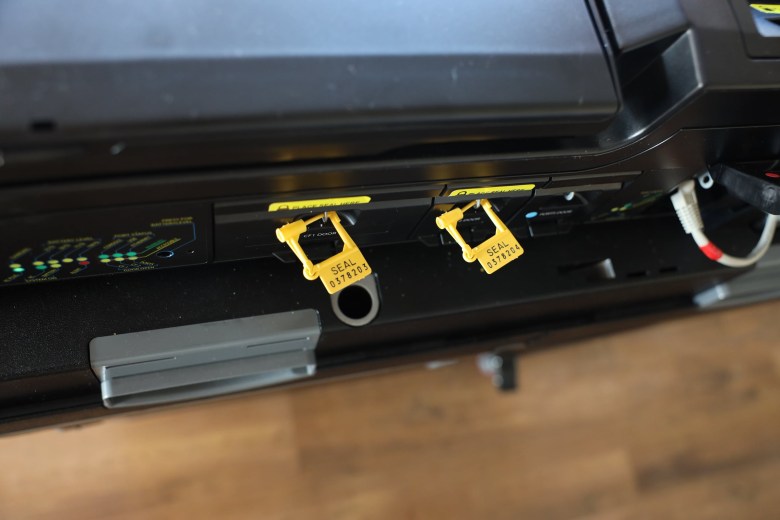 Yellow security seals are used to lock the election cartridges into the ballot tabulators. 