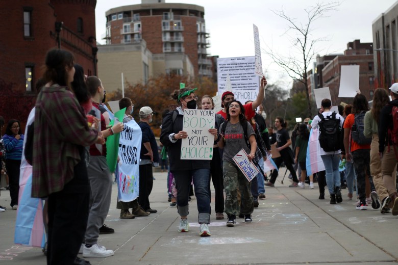 Protesters on the University of Wisconsin-Madison campus protest against an anti-trans activist.